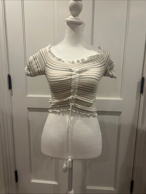 Storia Smocked off the shoulder tassel crop top